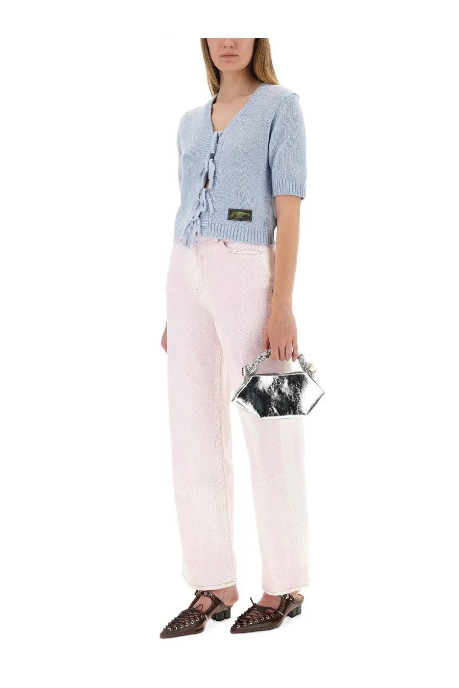 Silver and black cowhide mini handbag with chain handle paired with Ganni women’s jeans Izey blue