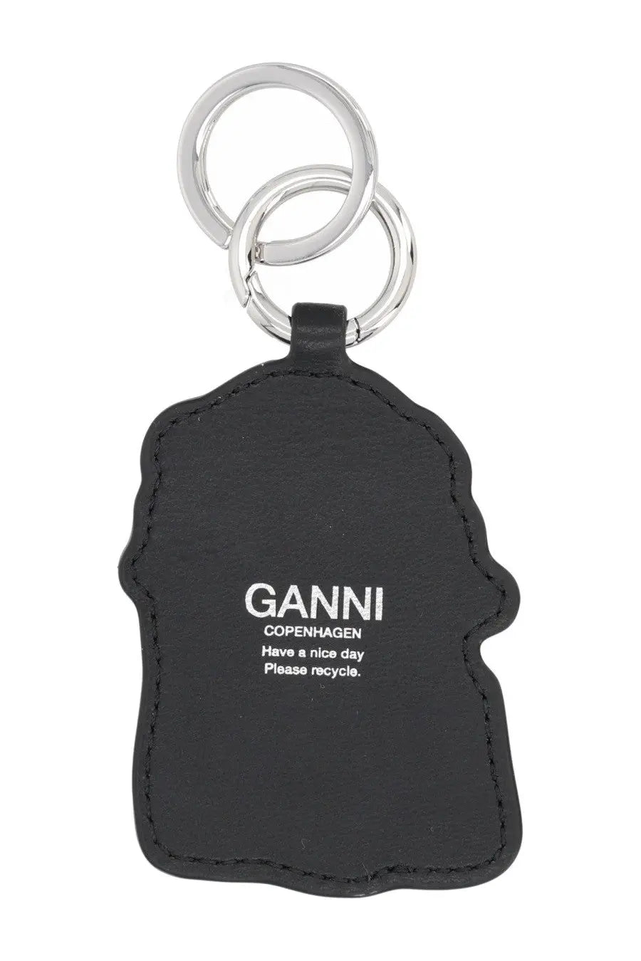 Ganni women’s black leather keychain with silver rings and white embossed text from Copenhagen please recycle design