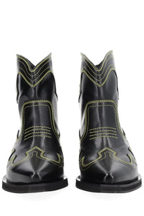Ganni women’s low shaft black leather cowboy boots with neon green stitching and pointed toe design