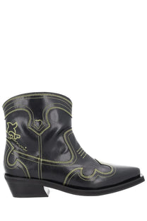 Ganni women’s low shaft black leather cowboy boot with neon yellow stitching and heart-shaped side design