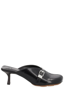 Ganni women’s black patent leather mule shoe with silver buckle and low heel shown from the back side