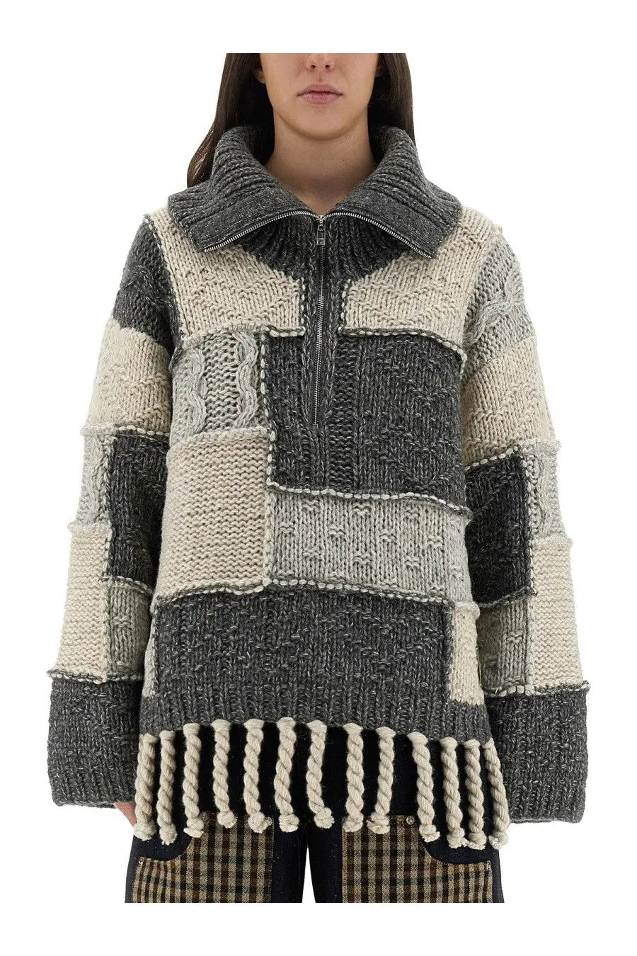 Ganni women’s chunky patchwork knit sweater in gray and off-white with high collar zipper and rope tassels at hem