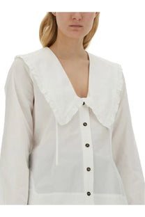 White blouse with a ruffled peter pan collar and black buttons from ganni womens collection in crisp cotton fabric