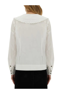 Ganni women’s white blouse with peter pan collar, ruffled detail, long sleeves, and subtle vertical seam accents