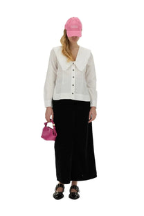 Pink structured mini handbag with top handle and metallic hardware paired with ganni women’s white peter pan collar shirt
