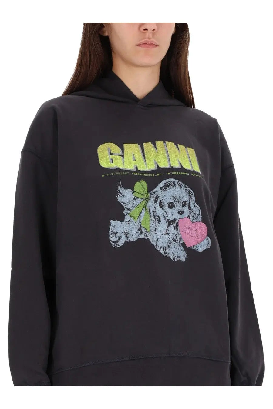 Black ganni women’s hoodie featuring a graphic cartoon dog with a green bow and pink heart on the front