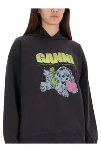 Black ganni women’s hoodie featuring a graphic cartoon dog with a green bow and pink heart on the front