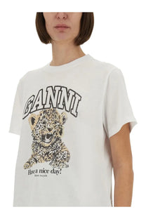 White ganni women’s t-shirt with bold leopard print graphic and brand name arched above with have a nice day below
