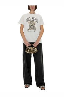 White ganni women’s shirt featuring a leopard graphic and have a nice day text on the front