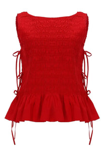 Vibrant red smocked sleeveless top by ganni with lace-up side ties and flared ruffle hem