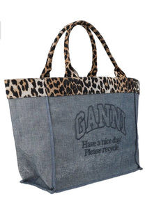 Ganni women’s blue denim tote bag with leopard print handles trim and ganni logo with recycle message