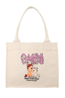 Cream-colored canvas Ganni women’s tote bag with pink dripping logo, cartoon ponies, and recycle message