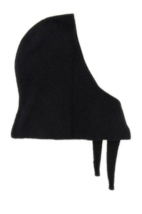 Black knitted woolen cape with asymmetrical draped silhouette and thin ties at hem from Ganni women’s wool balaclava black