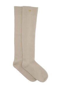 Beige ganni women’s wool knee-high socks with ribbed cuffs and small gold logo on the upper part