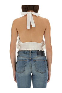 The Garment women’s Cyprus layer top white halter top with gathered smocked waistband and tied bow at the back view