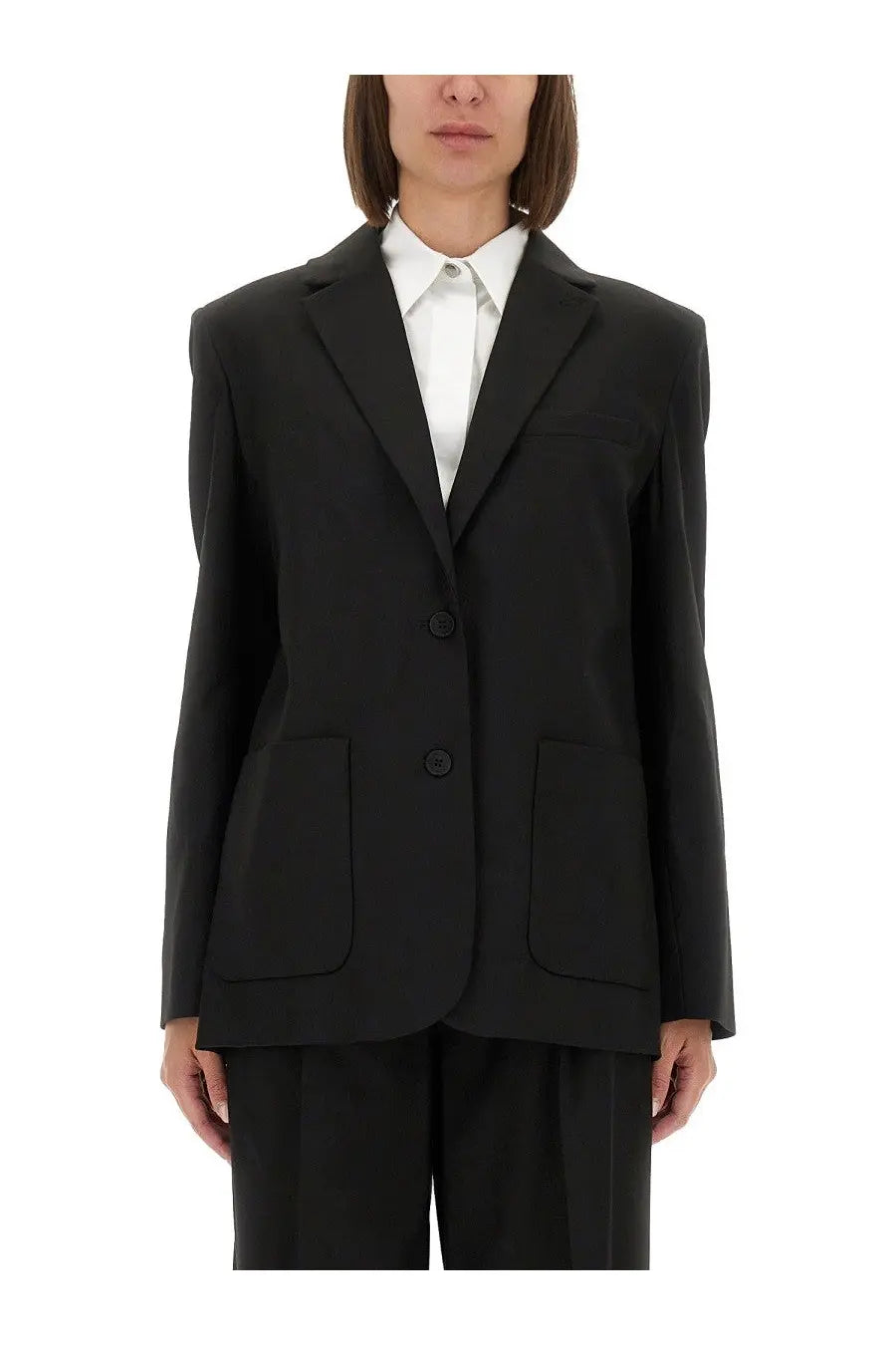 The Garment women’s Pluto blazer black tailored with structured shoulders and two front flap pockets