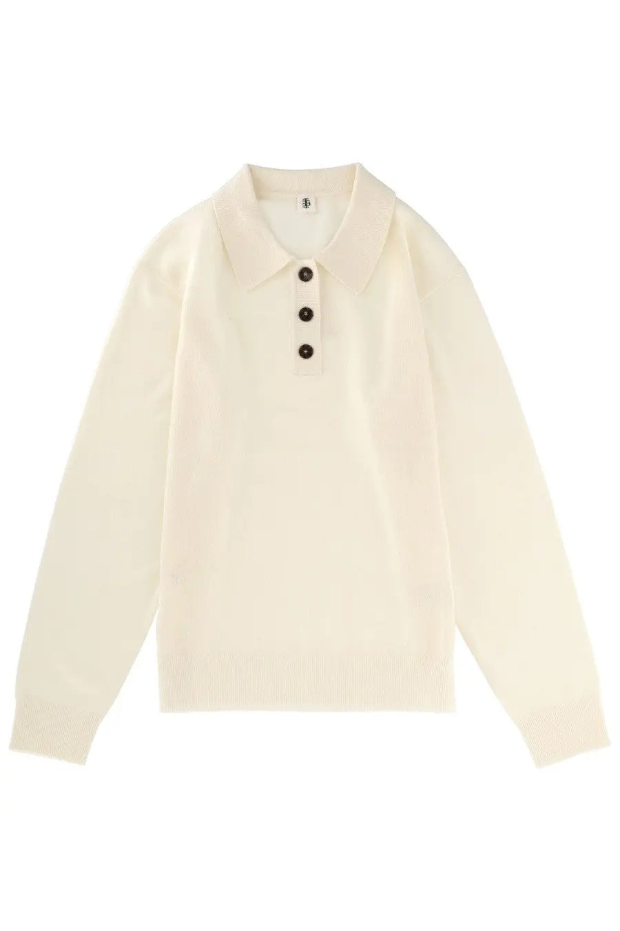 Cream-colored long-sleeved polo shirt with classic collar and dark buttons from The Garment Women’s Polo Como Beige collection