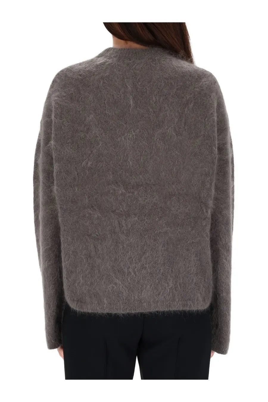 The garment women’s roma boyfriend sweater grey is a soft gray fuzzy knit with a relaxed fit and long sleeves