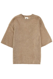 Beige oversized knit sweater from the garment with soft textured fabric and a relaxed fit for women