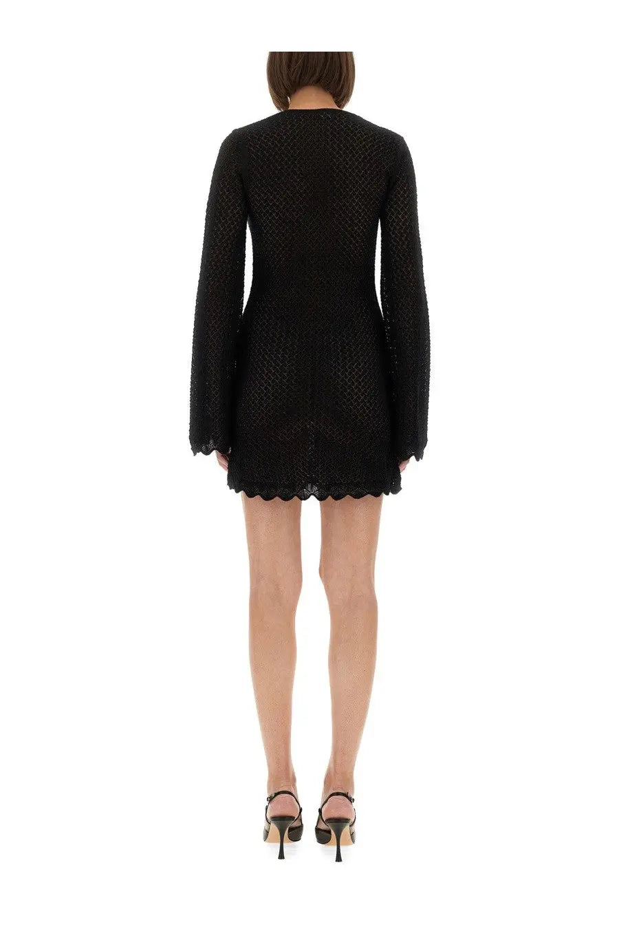 Black lace mini dress with long sleeves and scalloped hem from the garment women’s short dress tanzania black collection