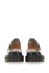 Black patent leather platform mary jane shoes with chunky sole and silver buckle details by gianvito rossi