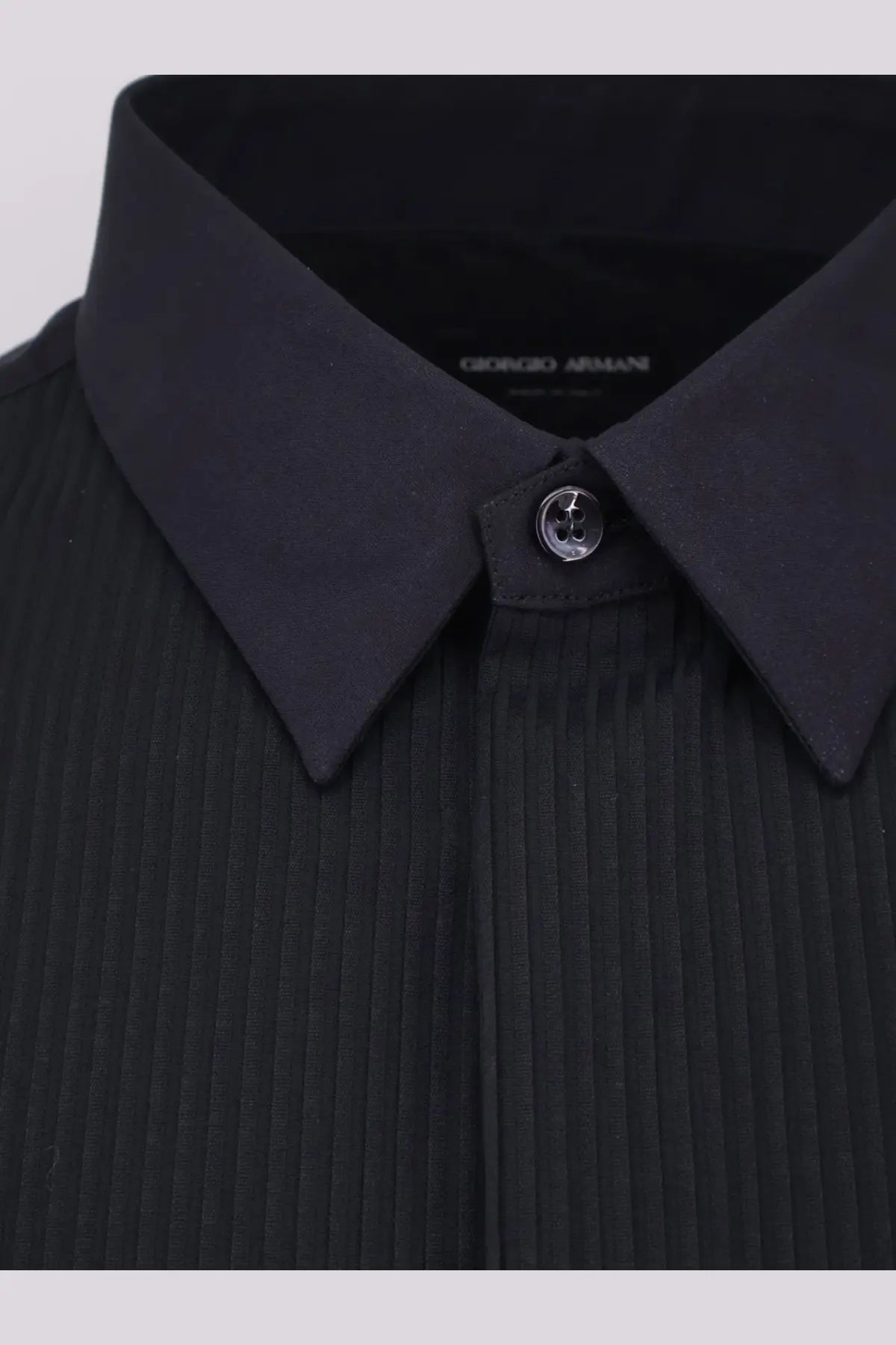 Giorgio Armani men’s black cotton ribbed shirt with structured collar and silver-toned logo button