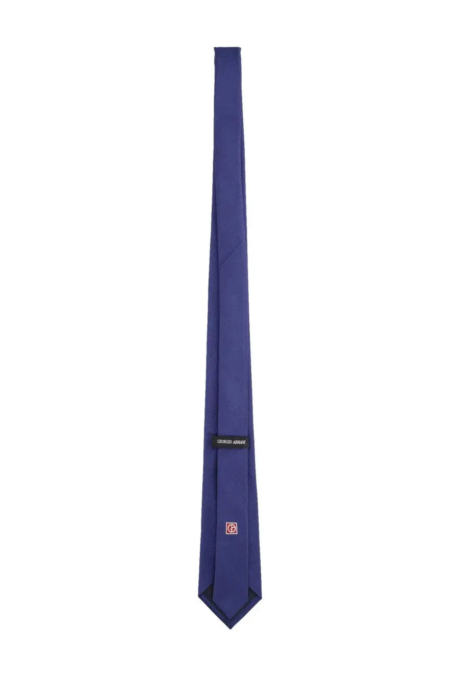 A sleek solid royal blue silk tie from Giorgio Armani designed for men