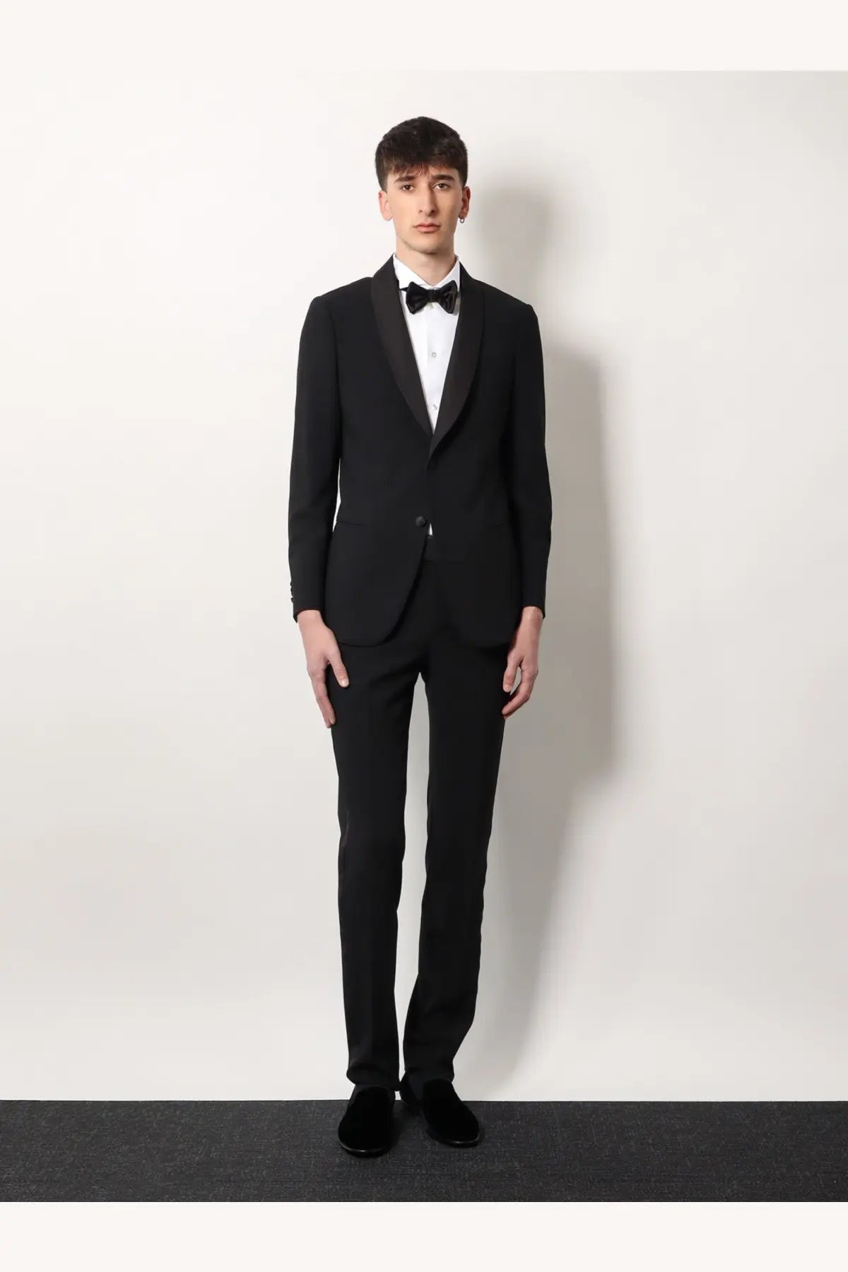 Black Giorgio Armani men’s Soho tuxedo made of virgin wool with satin lapels and matching trousers