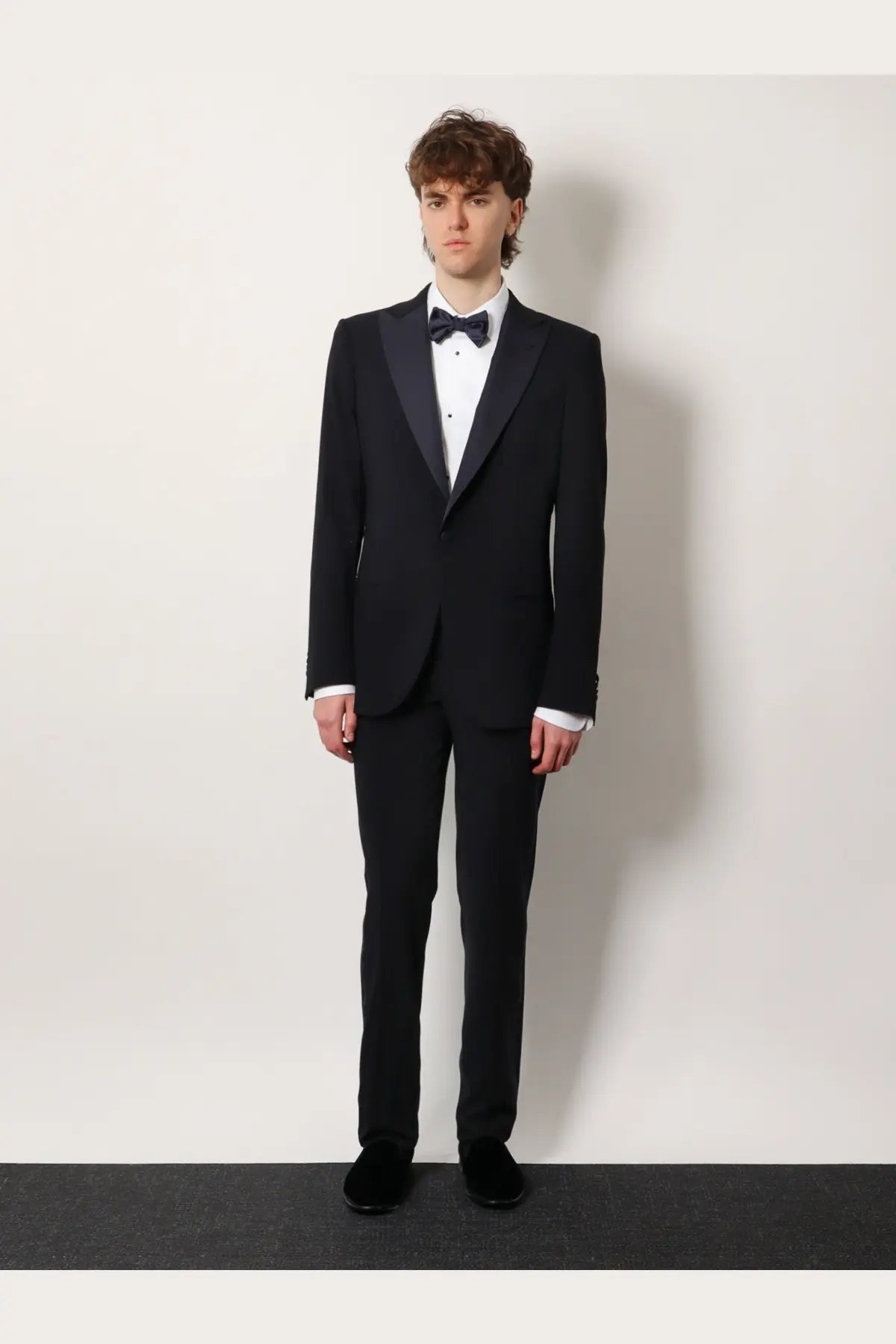 Black tuxedo with satin lapels and matching trousers in virgin wool by giorgio armani men’s soho blue