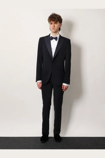 Black tuxedo with satin lapels and matching trousers in virgin wool by giorgio armani men’s soho blue