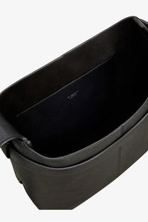 Black Givenchy men’s belted leather shoulder bag with structured minimalist design and visible stitching details