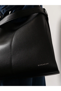 Black Givenchy men’s leather shoulder tote bag with belted design and subtle stitching details in minimalist style