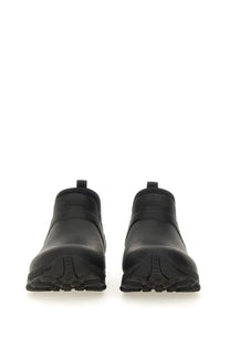 Givenchy men’s bogs black rubber Chelsea boots with sleek minimalist design and reinforced soles