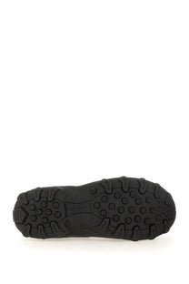 Black rubber sole with deep textured tread and embossed Givenchy logo on Givenchy men’s Bogs Chelsea boot black