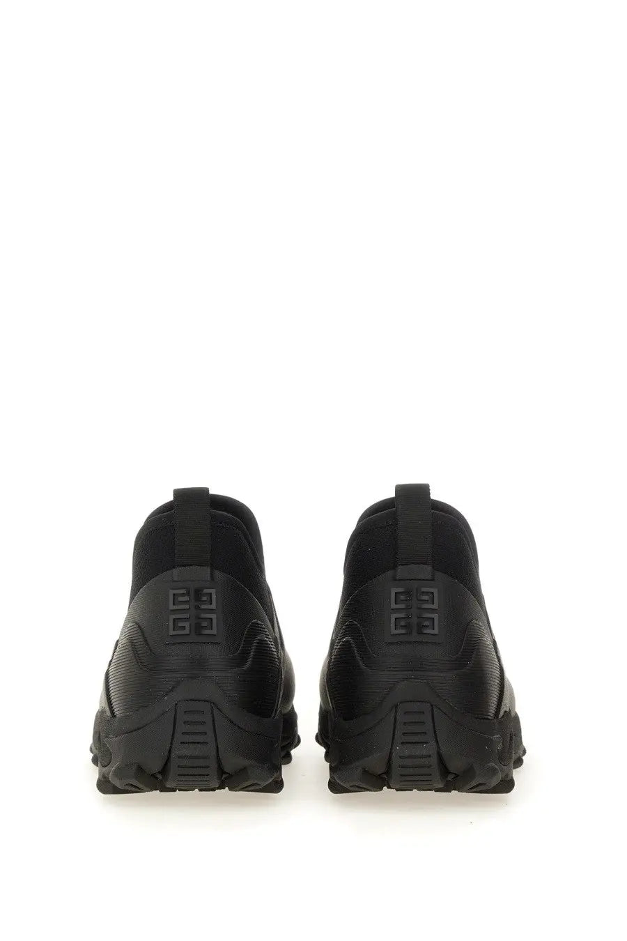 Black givenchy men’s bogs chelsea boot with sleek textured upper and chunky rubber sole for stylish wear