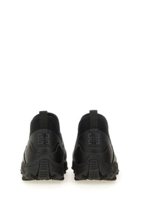 Black givenchy men’s bogs chelsea boot with sleek textured upper and chunky rubber sole for stylish wear