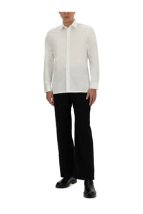 Givenchy men’s classic crisp white long-sleeved button-down shirt with a subtle textured fabric and classic collar
