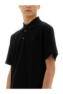 Givenchy men’s black cotton polo shirt with short sleeves and subtle logo embroidered on the chest