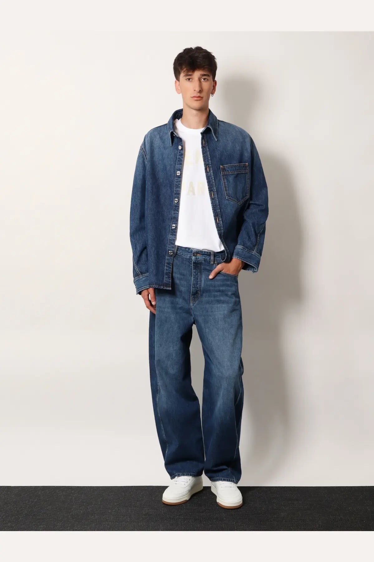 Blue denim jacket with button-up front and chest pocket styled with givenchy men’s cotton white shirt