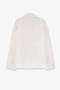 Givenchy men’s off-white minimalist blazer with subtle diagonal stitching on sleeves in denim jacket style