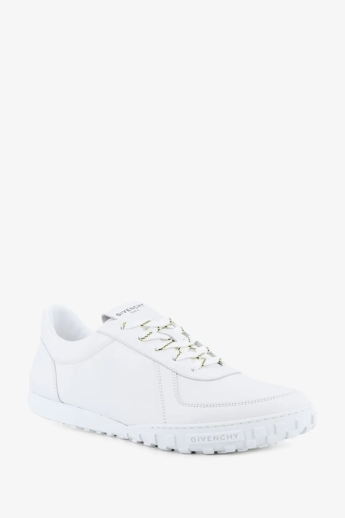 Givenchy men’s glide runner leather sneakers in white featuring matching laces and a textured rubber sole