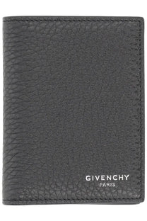 Black textured leather Givenchy Paris passport holder showcasing grain leather design for men’s card organization