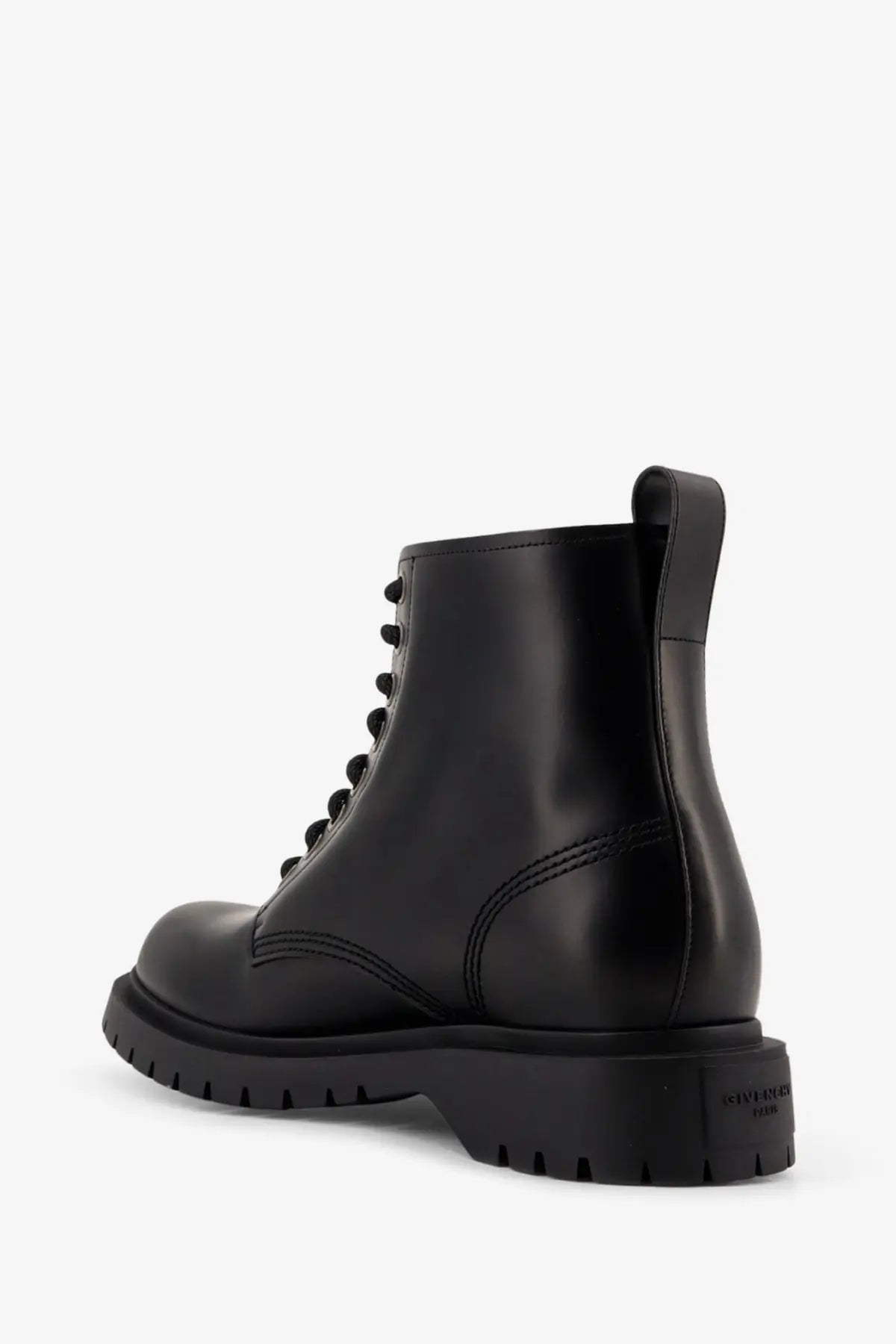 Givenchy men’s black leather ankle combat boot with chunky rubber sole and visible stitching details