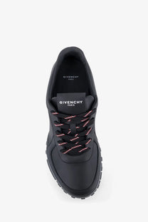 Givenchy men’s black leather sneaker with subtle pink thread detailing on the laces for stylish wear