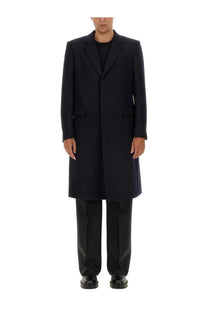 Givenchy men’s black wool overcoat with notched lapels and two front flap pockets for stylish outerwear