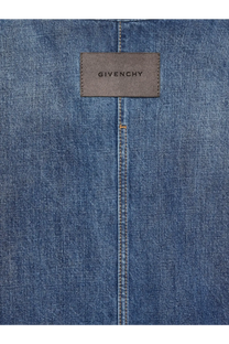 A brown leather givenchy label stitched on medium-wash blue denim fabric of givenchy mens overshirt denim shirt
