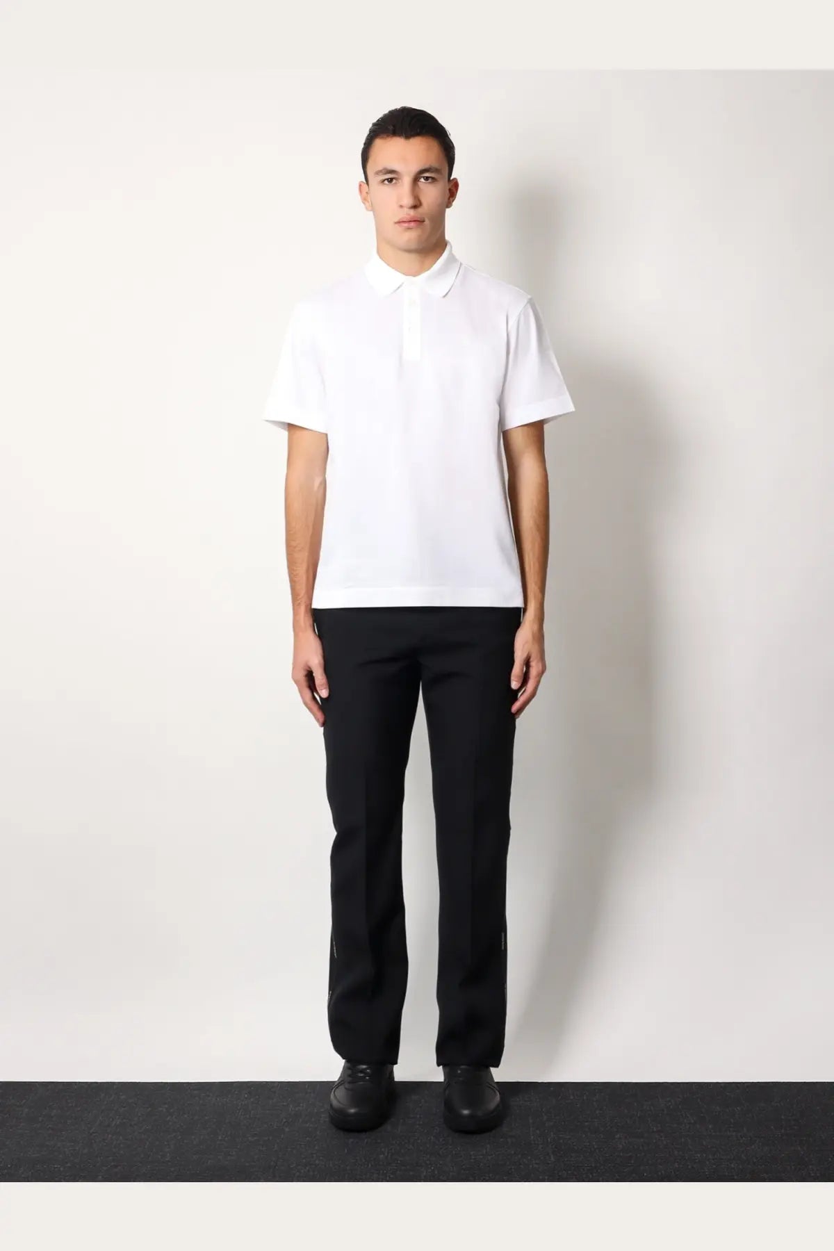 Givenchy men’s white piqué cotton polo shirt with short sleeves and a classic collar in a minimalist design