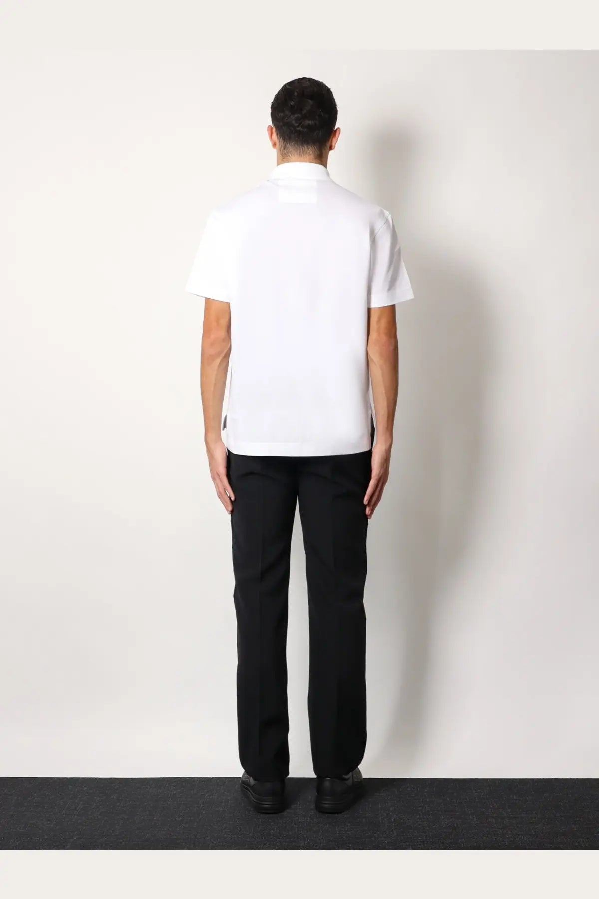 Givenchy men’s white piqué cotton polo shirt with short sleeves and a clean minimalist collar design