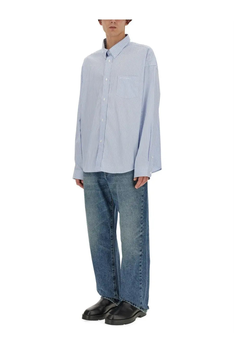 Light blue and white striped long-sleeved button-up shirt with classic collar paired with givenchy mens blue jeans