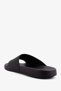 Givenchy men’s black platform slide sandal with sleek minimalist design made of smooth rubber material